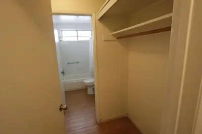 a bathroom with a toilet and a window at 3 beds Apart in Beverly Hills Neighborhood in Los Angeles