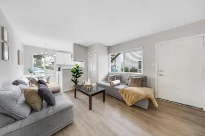 a living room with a couch and a table at Oneluxstay Near Redondo Beach in Redondo Beach