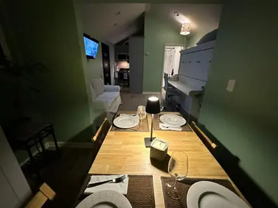 a room with two toilets and a table in a room at No Ho Casita in North Hollywood