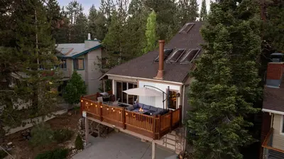 an aerial view of a house with a deck at Lakeview Bear Cubs Den - Walk to Lake, Close to Slopes in Big Bear Lake