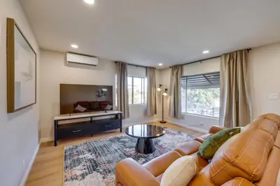 a living room with a couch and a table at Walkable Home Base Near LLUMC and Campus! in Loma Linda