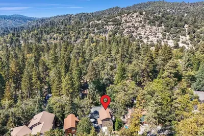 an aerial view of a house with a red marker at Arrowbear Retreat - EV Charging, Generator, Arcade in Arrowbear Lake