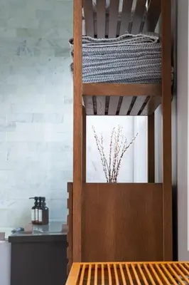 a wooden bunk bed with a vase on top at Lovely Culver City Home 8 Mins to Beach Close to LAX in Los Angeles
