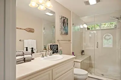 a bathroom with a sink and a shower and a toilet at Home Sweet Home in Big Bear Lake