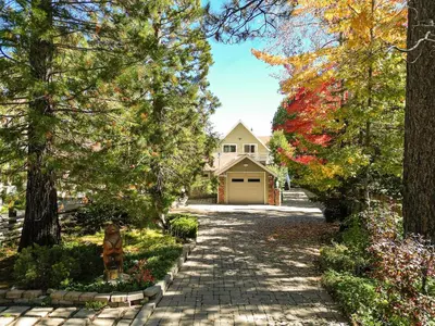 a driveway leading to a house with a garage at Home Sweet Home in Big Bear Lake