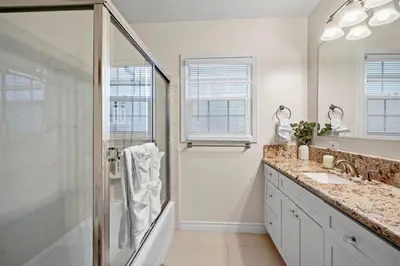 a bathroom with a shower and a sink at Steps to the Beach - Games - Free Parking in Long Beach