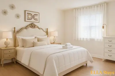 a white bedroom with a white bed and a window at Rowland Heights Cozy & Quiet Home in Rowland Heights