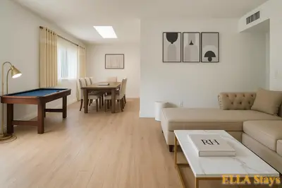 a living room with a couch and a table at Rowland Heights Cozy & Quiet Home in Rowland Heights