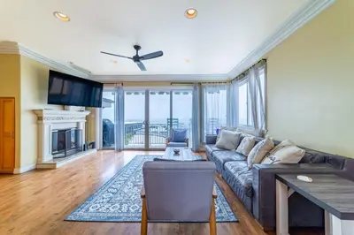a living room with a couch and a table at Ocean View Penthouse 2 Bdrm 2 Bath w garage 2 Blocks to sand in Manhattan Beach