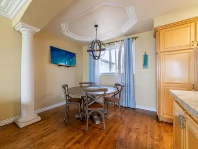 a dining room with a table and chairs at Ocean View Penthouse 2 Bdrm 2 Bath w garage 2 Blocks to sand in Manhattan Beach
