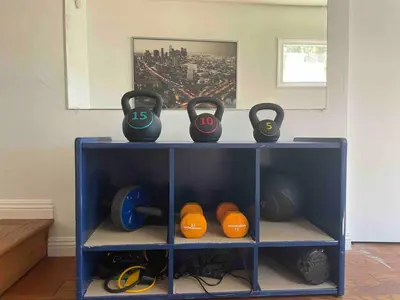 a shelf with four pairs of scissors on it at 2BR LA Beach City House With Gym & Tesla Charging in Harbor City
