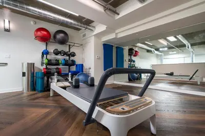 a room with a gym with a treadmill at the in Los Angeles