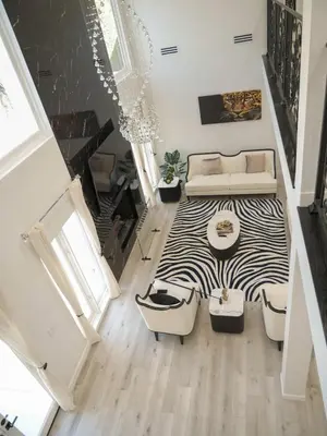 a large room with a bed and a couch at Sleek 7BR Exquisite Estate Resort Pool, Sauna, Spa 6500 SQF in Woodland Hills