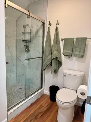 a bathroom with a shower and a toilet at Skylight Terrace in Los Angeles