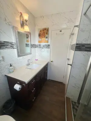 a bathroom with a sink and a shower at Asian Food Galler Single house in San Gabriel
