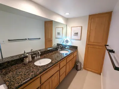 a bathroom with two sinks and a large mirror at Walk 2min to BEACH! Boho 3-Bedroom BEACH Pad with AC, Patio, Laundry & Mid Size Parking in Long Beach