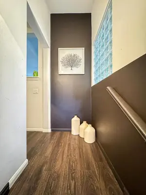 two rolls of toilet paper sitting on the floor of a hallway at Charming 4-Bedroom Home Near Bel Air - BG - WW in Los Angeles