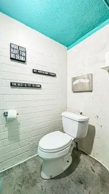a bathroom with a white toilet in a room at Charming 4-Bedroom Home Near Bel Air - BG - WW in Los Angeles