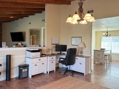 an office with a desk with a computer and a chair at Desert Ranch Retreat in Lancaster