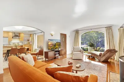 a living room with a couch and a table at Charming 2BR 2BA Los Angeles Home with Character in Sherman Oaks Community Hospital Heliport