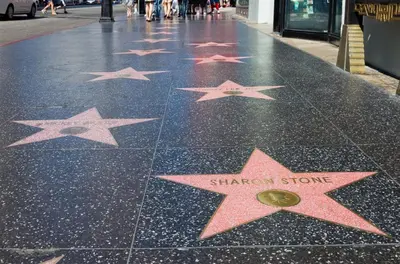 a row of stars on the floor of a sidewalk at Studio Haven in the Heart of Hollywood in Los Angeles
