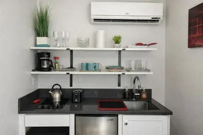 a kitchen with a sink and a counter top at Studio Haven in the Heart of Hollywood in Los Angeles