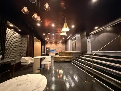 a room with a couch and a table and chairs at Modern & Popular Hollywood Studio at GW in Los Angeles