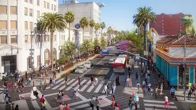 a group of people crossing a street in a city at Compact Hollywood Studio in Los Angeles
