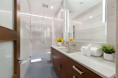 a bathroom with a sink and a shower at Ultra Luxury 5BR Beverly Hills Estate with Private Pool Spa and Canyon Views in Los Angeles