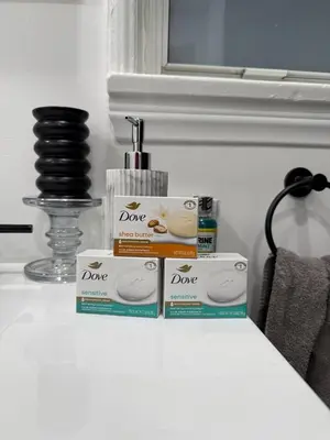 three boxes ofodorizers sitting on a counter in a bathroom at Modern2BR Home SoFi LAX Parking Fast WiFi in Los Angeles