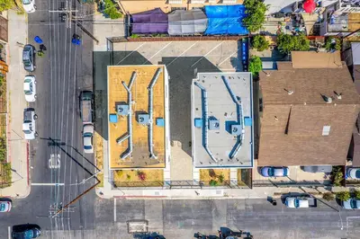 an overhead view of a parking lot with buildings at Spacious 4BR Townhouse with Free Parking Near DTLA in Los Angeles