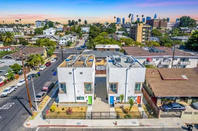 an aerial view of a city with a white house at Spacious 4BR Townhouse with Free Parking Near DTLA in Los Angeles