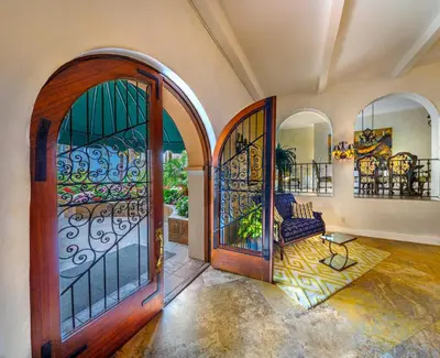 an entry to a home with an open door at The Sovereign in Los Angeles