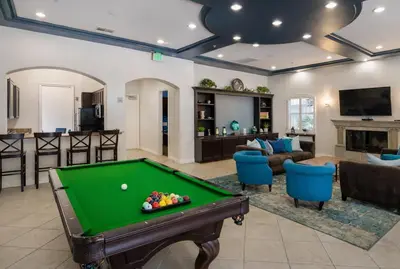 a living room with a pool table at Demo3 in Los Angeles