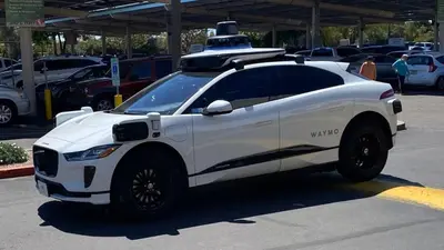 a white police car parked in a parking lot at Modern 2BR Guest Suite w En-Suite Bathrooms 10 min to Rodeo Drive Near Kaiser and Cedars hospitals in Los Angeles