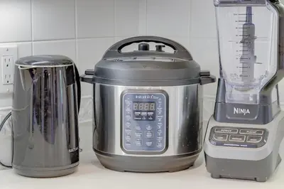 a blender and a juicer sitting on a counter at 5 bedroom home 2 miles from Loma Linda Medical in Loma Linda
