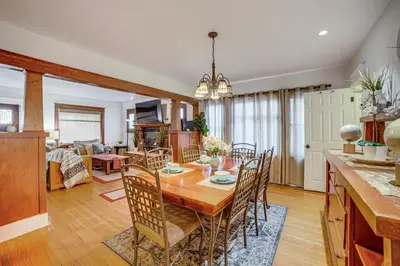 a dining room and living room with a table and chairs at Home half Mi to Dtwn Riverside Families Welcome! in Riverside