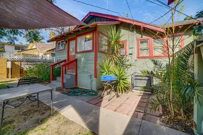 a house with a picnic table in front of it at Home half Mi to Dtwn Riverside Families Welcome! in Riverside