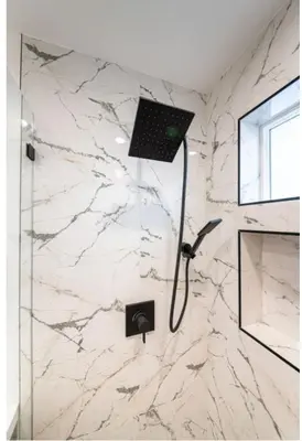a bathroom with a shower with a laptop on the wall at Stellar Sherman Oaks One Bedroom close to Universal Studios in Burbank