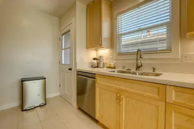 a kitchen with a sink and a dishwasher at Southbaysunshine coastal Villa by beach-30 plus Days in Torrance