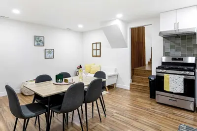 a kitchen and dining room with a table and chairs at Family Retreat Near Disneyland & Downtown LA 4BR in Los Angeles