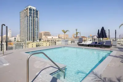 a swimming pool on the roof of a building at DTLA Boutique Loft w Rooftop Pool Hot Tub in Los Angeles