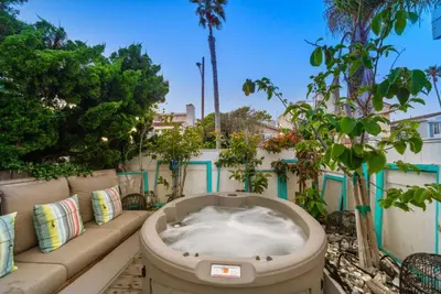 a bath tub sitting on the side of a building at Luxe Beachside Escape Near Channel Islands in Oxnard
