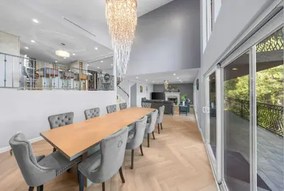 a dining room with a long table and chairs at Tranquil Hideaway Private Retreat with Mountain Views in Tujunga
