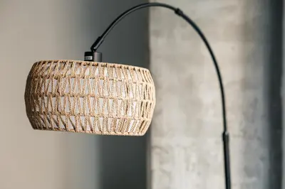 a lamp with a wicker shade on a wall at Spacious 2bedroom in Hollywood with Parking Gym Pool in Los Angeles