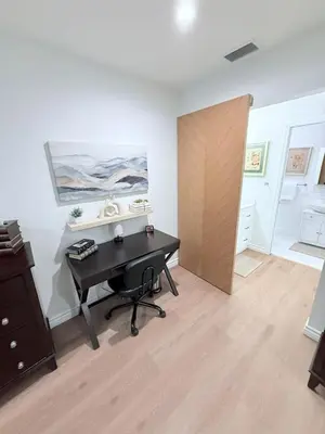 a room with a black piano and a wooden door at Private 3BR Home - Hot Tub, Yard, Arcade & Parking in Simi Valley
