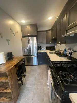 a kitchen with a stove and a refrigerator at Cozy 1 Bedroom Tarantino Unit Studio City in Los Angeles