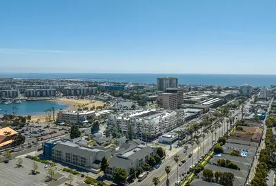 an aerial view of a city with buildings and the ocean at Admiralty 2BD Luxe Retreat with FREE PARKING in Los Angeles