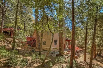 a house in the middle of the woods at Arrowhead Cabin Near Lake and Village in Lake Arrowhead
