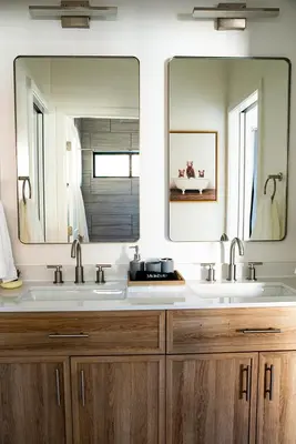 a bathroom with two sinks and two mirrors at Bearadise, LuxuryNew Build, Central, Hot Tub, EV ,Games in Big Bear Lake